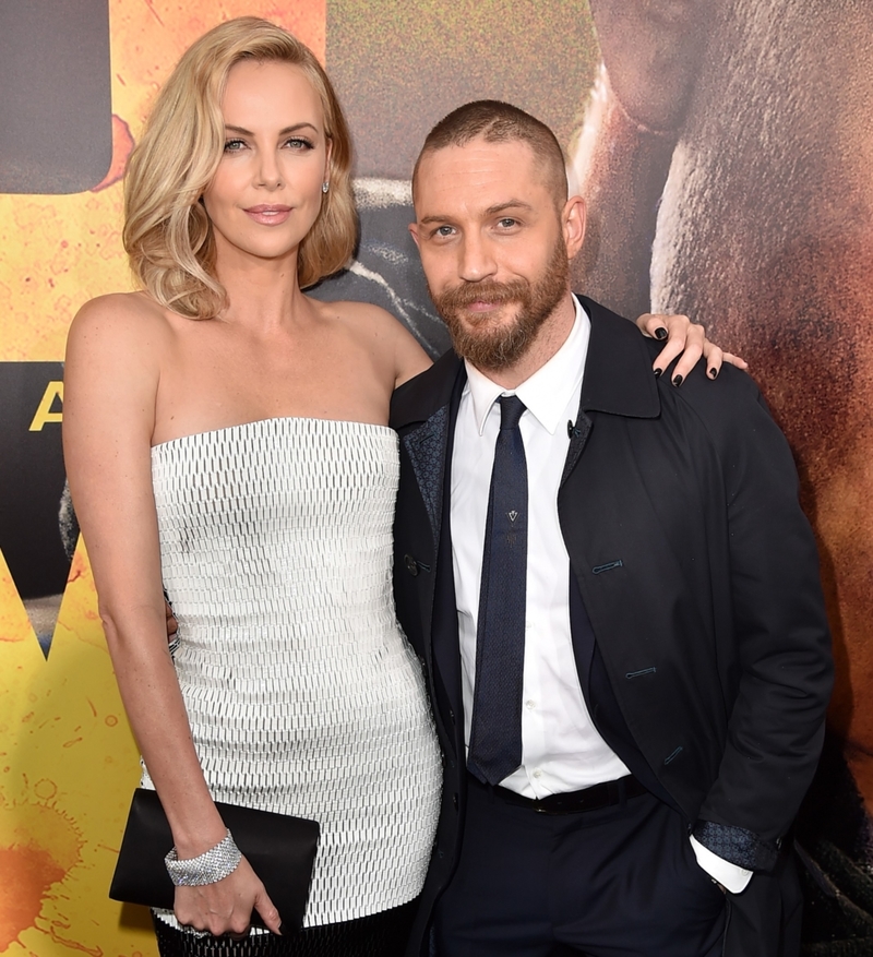 Tom Hardy and Charlize Theron | Getty Images Photo by Kevin Winter