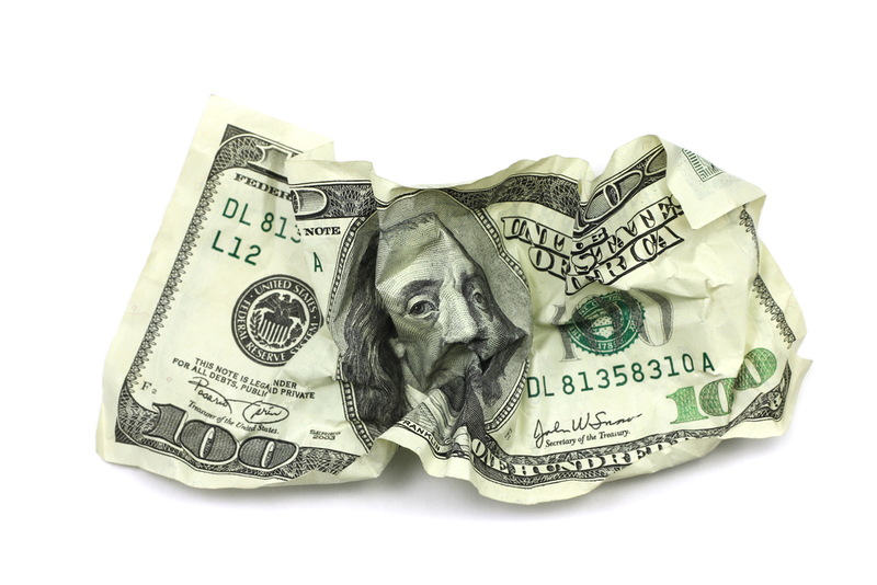 Using Crumpled Bills | Shutterstock