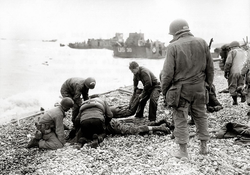 Helping Troops On Omaha Beach | Getty Images Photo by Galerie Bilderwelt