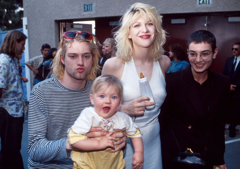 Cobain et Love avec leur mini moi | Getty Images Photo by Kevin Mazur/WireImage