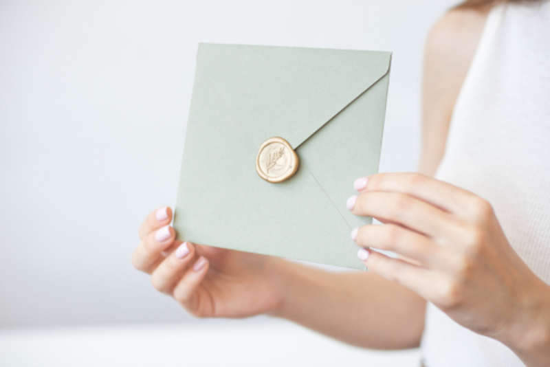 Guessing A Name in A Sealed Envelope | VBStudio/Shutterstock