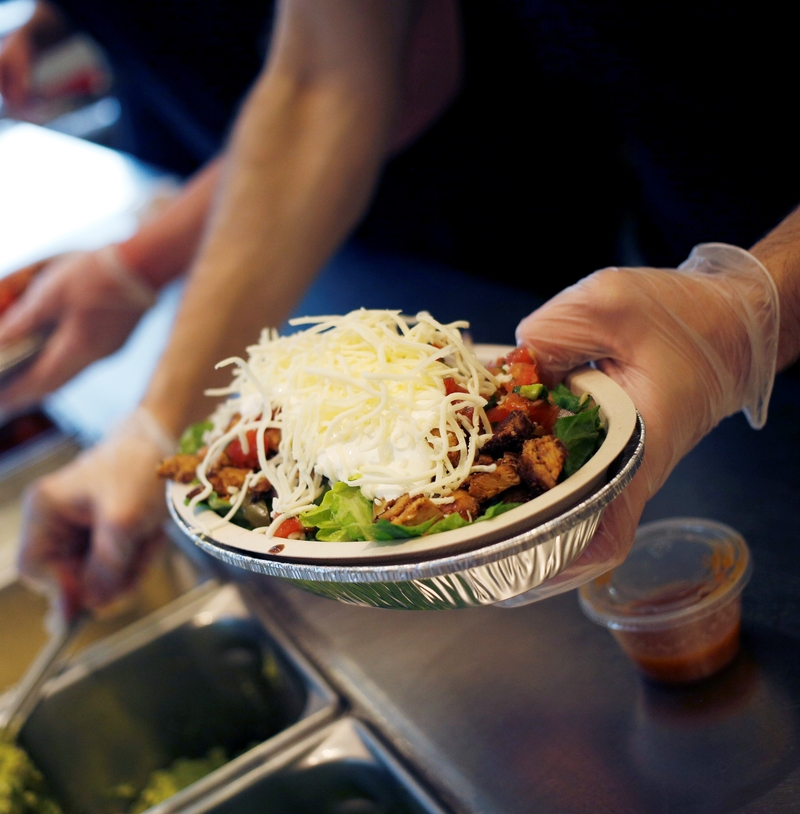 Order a Chipotle Burrito Bowl Instead of a Burrito | Getty Images Photo by Luke Sharrett/Bloomberg 