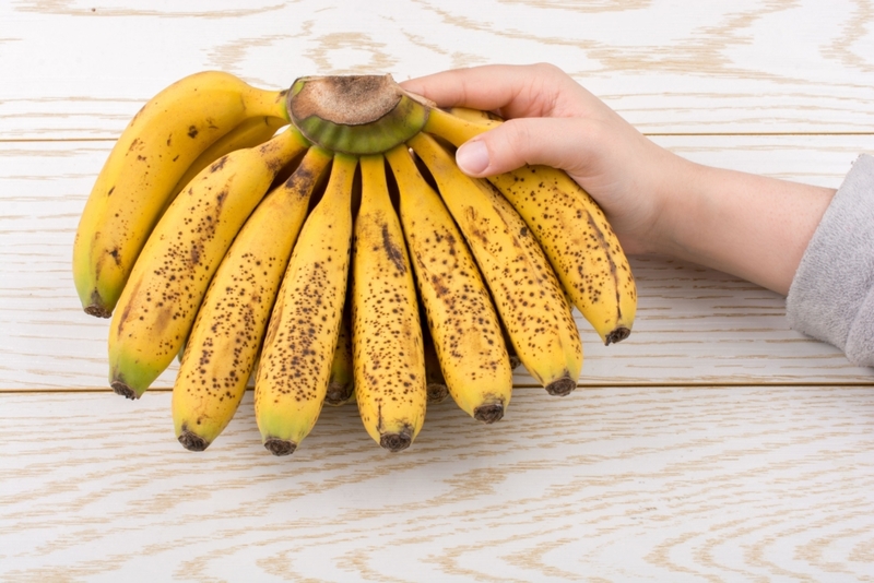 Eating Too Many Bananas | Alamy Stock Photo