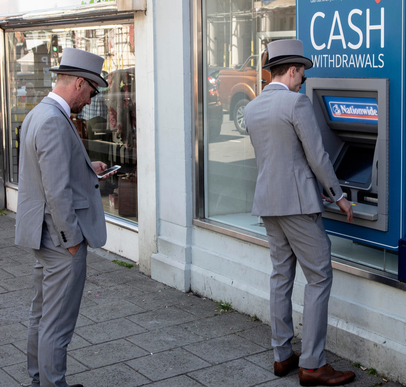 Top Hats at the ATM | Alamy Stock Photo by Graham Franks 